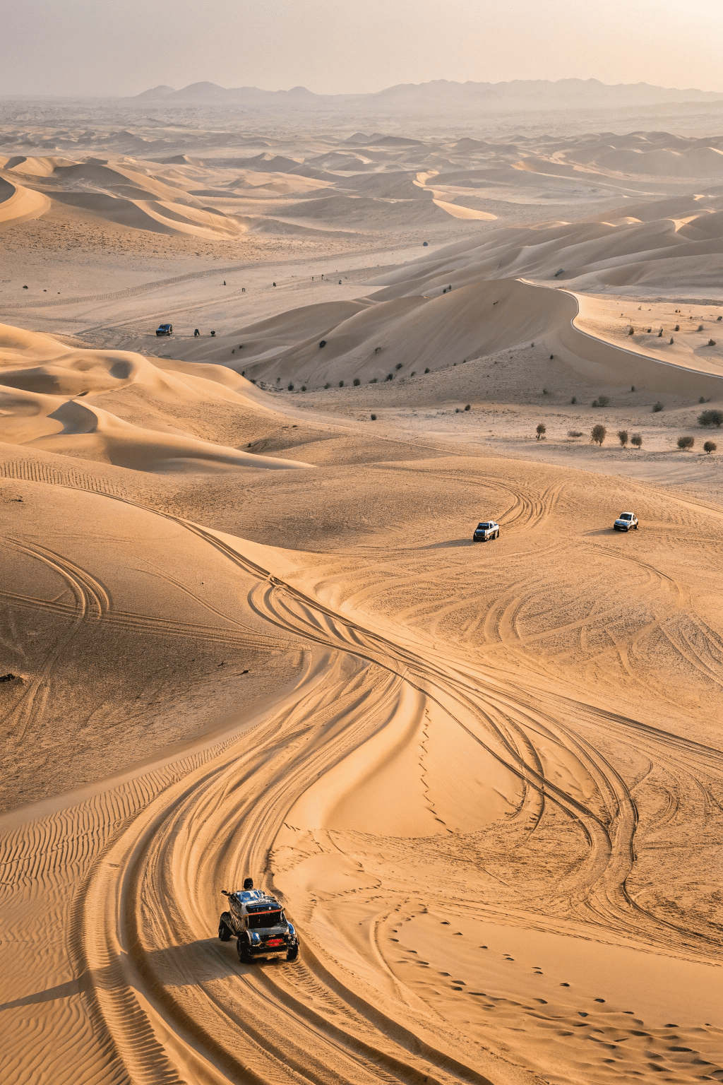 an-aerial-view-of-buggies-carving-trails-through-e (2)